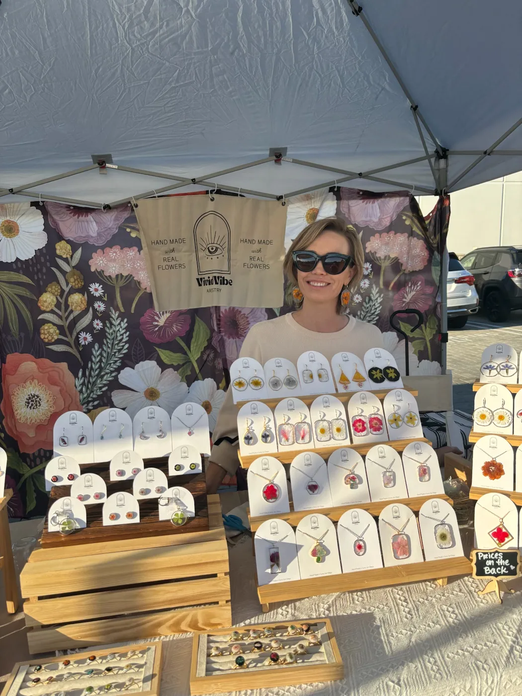 A local jewelry maker and her colorful display