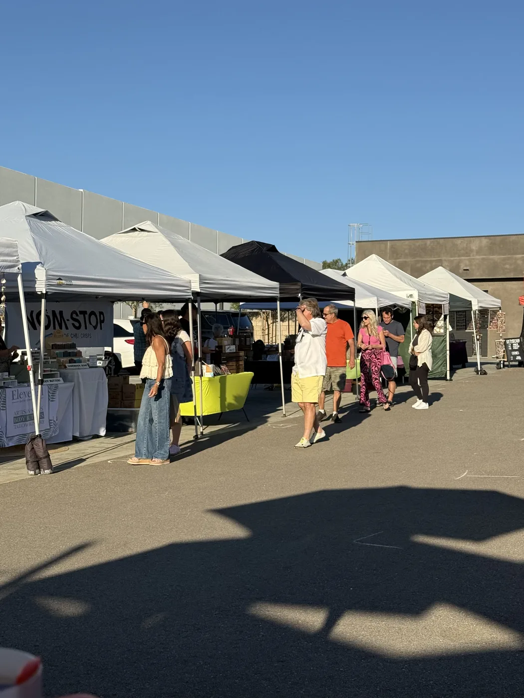Visitors enjoying Open Market's local vendor stalls